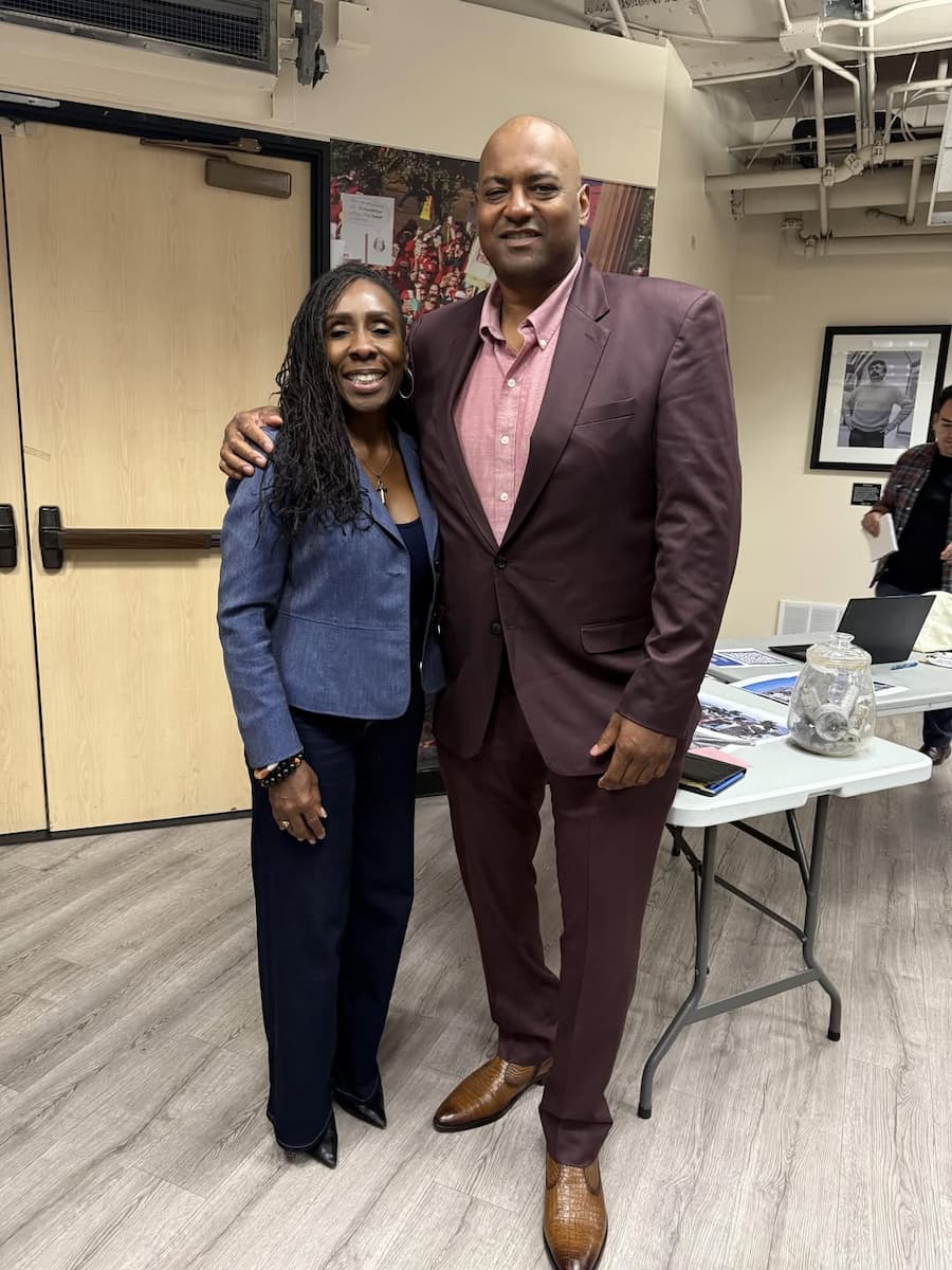 Cedric with supporter at community organizing event