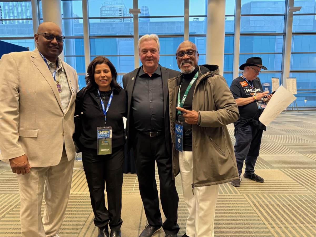 Cedric with group at convention center