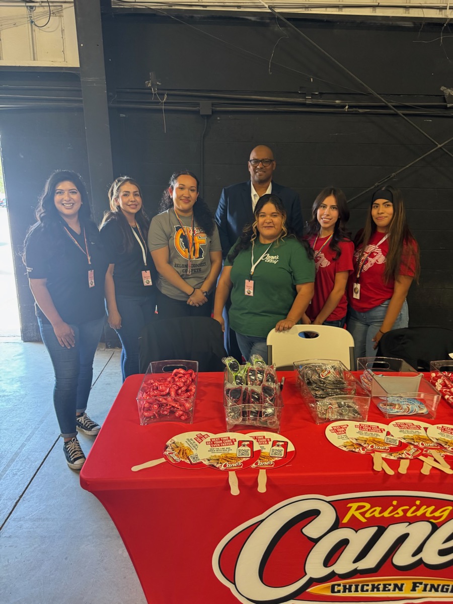 Cedric with youth volunteers at community event